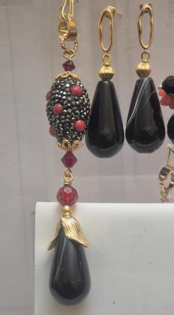 Black and gold (or silver) earrings and pendant set. Various designs.