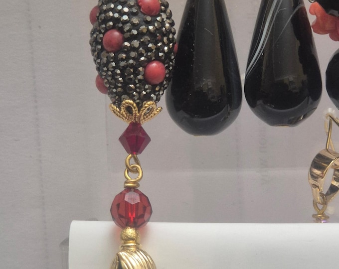 Black and gold (or silver) earrings and pendant set. Various designs.