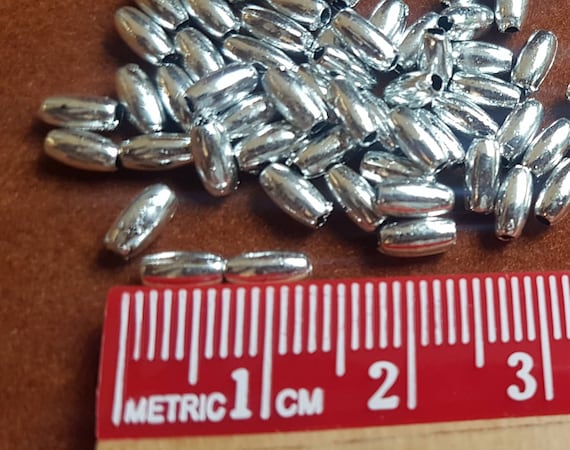 3x6mm silver plated rice beads(100/250/500 beads) 1.5mm hole for jewellery, flower sprays, vines and DIY & wedding craft and more