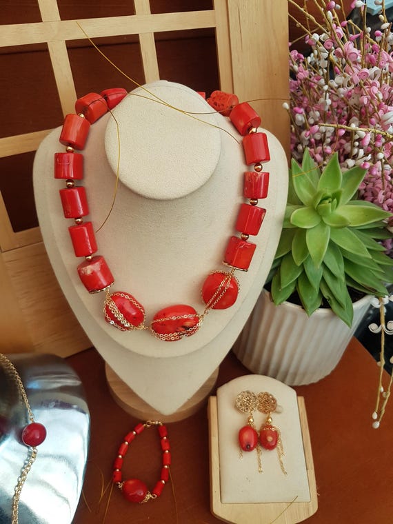 18" Coral and gold set. Nuggets and barrels with gold trim. Matching earrings and bracelet.