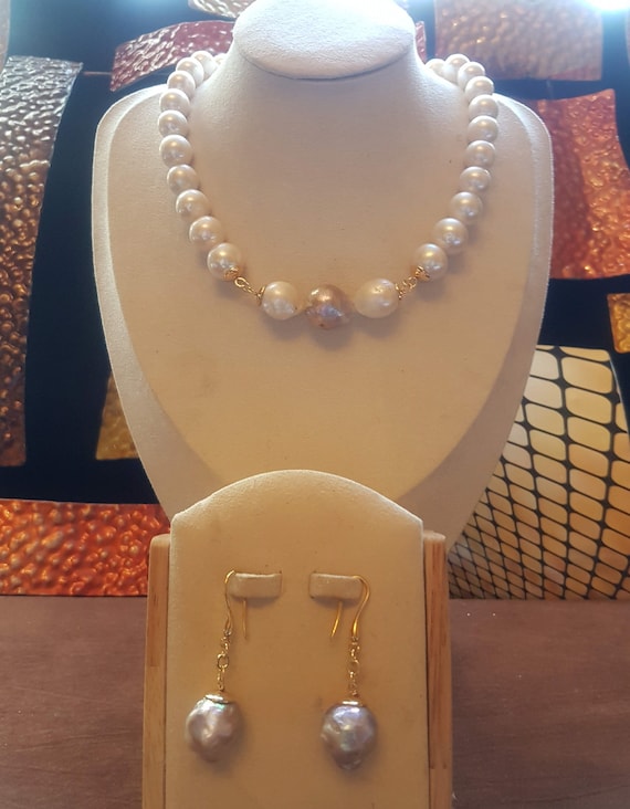 Baroque pearl necklace set with 3 larger gold-capped beads as front detail. Simply elegant design. Weddings, Anniversaries, birthdays, self.