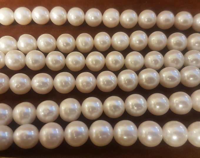 A+ Oval Freshwater Pearls: 10-11 mm, sold as packs of 10, 15, 25 or 50