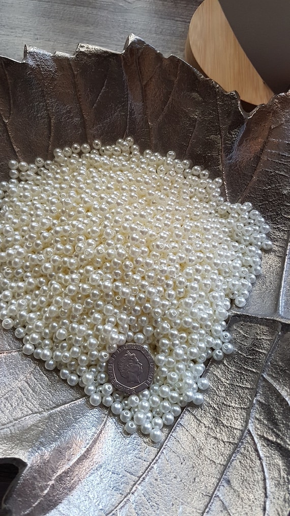 Larger quantity, 1200 x 6mm, Ivory pearls, acrylic beads. Very high luster. For jewelry designers, art & craft, wedding projects. Save money
