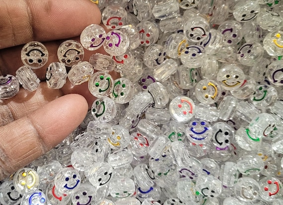 6mm transparent smiley face acrylic beads for fun children's projects. DIY craft projects, fun jewellery making for all. Christmas colours.