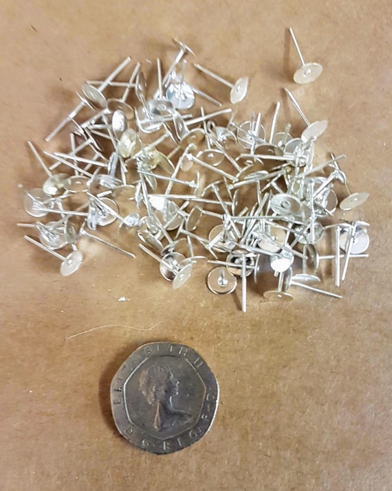 7mm silver plated earring flatback finding with 12mm  post. 12 in pack.