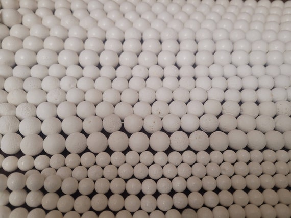 16 inches white bamboo coral simple round  beads. beads are 10/14 & 18 mm. Bracelets, necklaces, earrings and more. Nigerian Wedding Beads