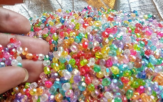 Clear or mixed colours 3x4 mm acrylic, faceted, plastic beads for DIY craft projects, jewellery making, frame decorating. Christmas craft.