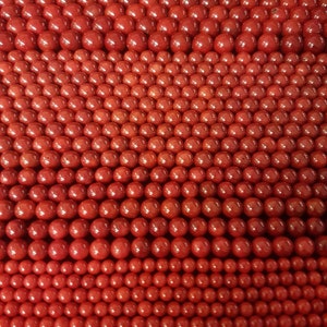 Genuine rare red bamboo coral loose beads on a string or in a bag. Dyed and polished, Simple and dynamic. Beads are  4mm, 5mm or 6mm.