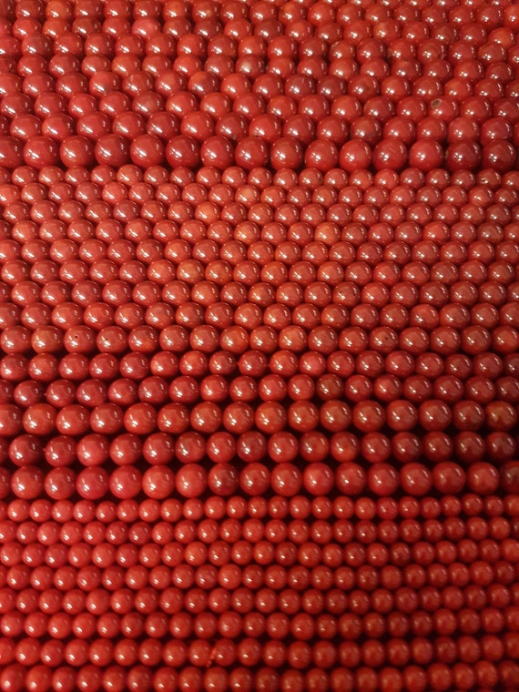 Genuine rare red bamboo coral loose beads on a string or in a bag. Dyed and polished, Simple and dynamic. Beads are  4mm, 5mm or 6mm.