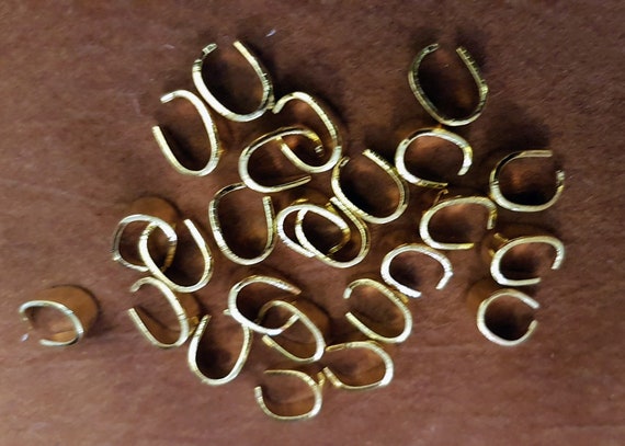11 x 4mm gold or silver plated bails for pendants or charms, jewelry making, connectors. Pack of 20.