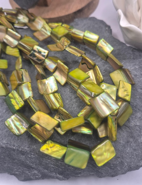 Green Mother of Pearl Vintage beads. 15x15mm approx. On a 15.5-inch string. Gemstones for designers. Dyed to this color. 28 beads per strand