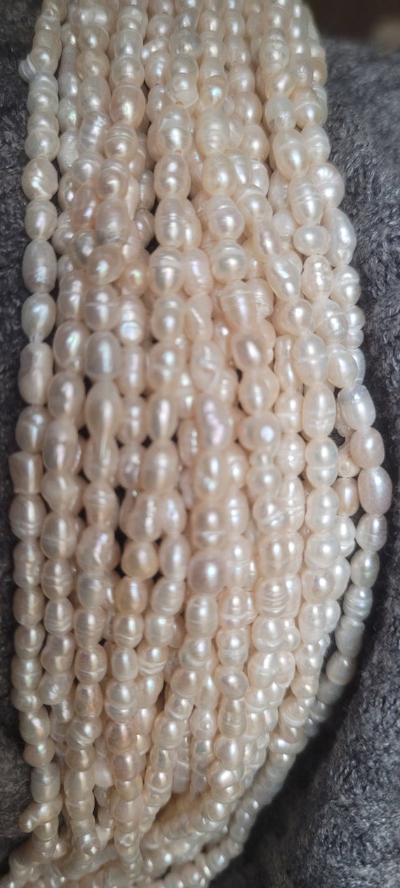 Tiny baroque ivory pearls 5x4mm approx. Each strings is 14 inches long. High luster, beautiful top quality pearls. Best ones are here!