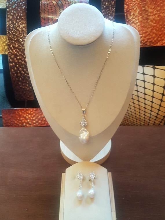 Large baroque freshwater pearl 32mm x 20mm pendant set with cubic zircon and 460mm delicate chain. You will receive this specific set.