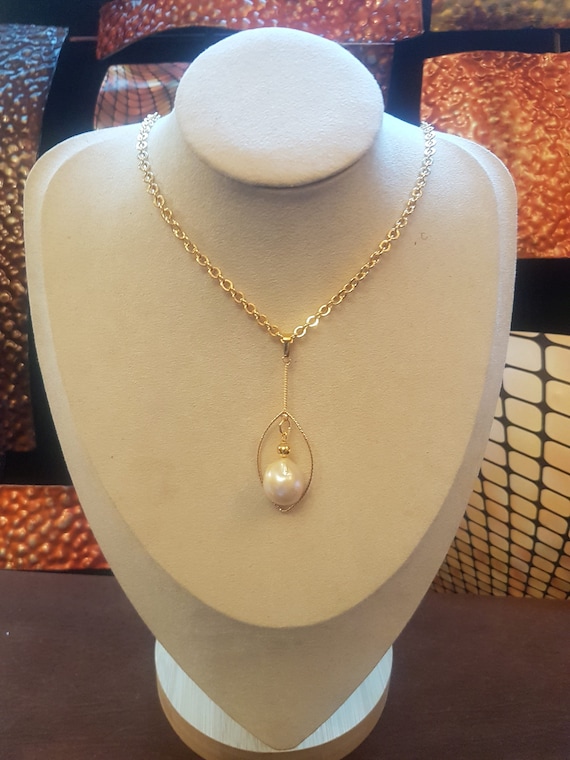 Aesthetic Baroque freshwater pearl pendant 18  x 16mm  with gold-plated detail, 460mm long  chain.