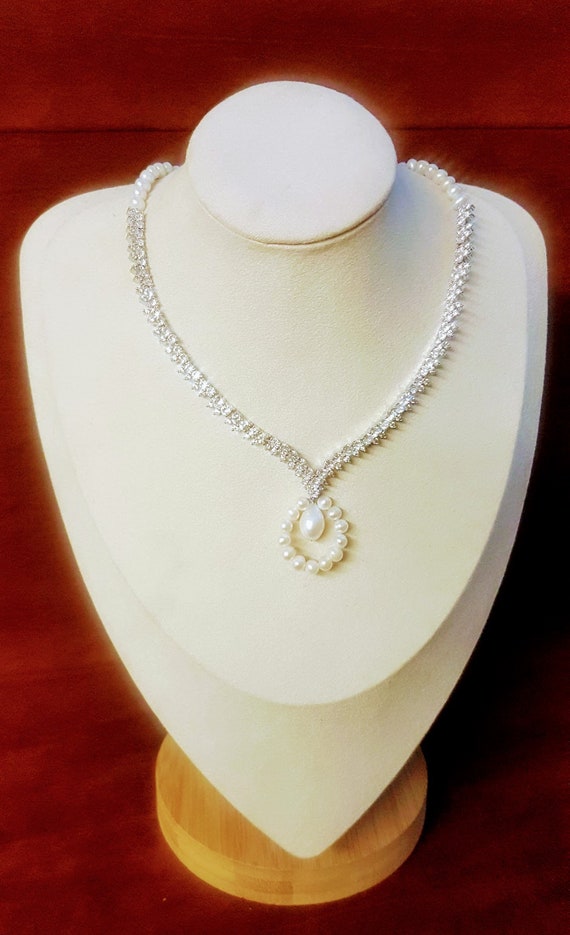 Cubic zircon and freshwater pearl bridal necklace.