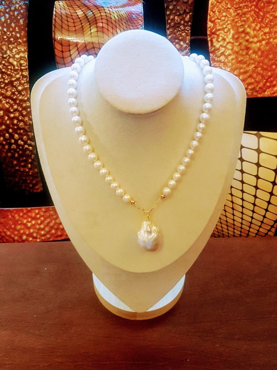 AAA Freshwater Pearl Necklace With Front Baroque 25x18mm Approx. Large Pearl.  Beads Are 6mm. Please Note Baroque Pearls Vary in Shape & Size -   Finland