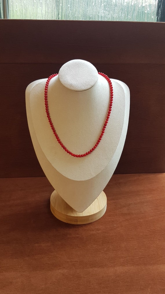 Red coral beaded necklace. The necklace is 18" long, designed for simplicity and elegance. Beads are 4mm, 5mm or 6mm.