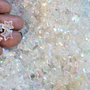 12mm clear AB stars acrylic beads (100 pack) for fun children's projects, DIY craft projects, fun jewellery making. Frame decorating.