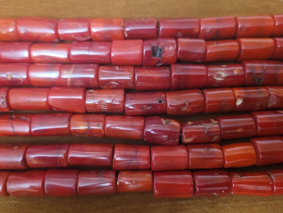 16" red barrel bamboo coral simple beads. Each barrel is approximately 15mm x 10mm. Coral is dyed dark red. Weddings are exciting times!