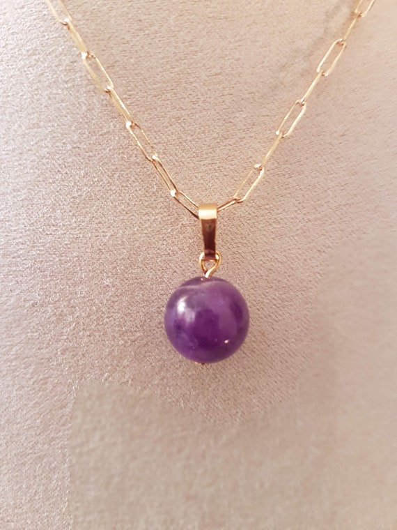 Amethyst gemstone charm  pendant.  Ideal for him or her.