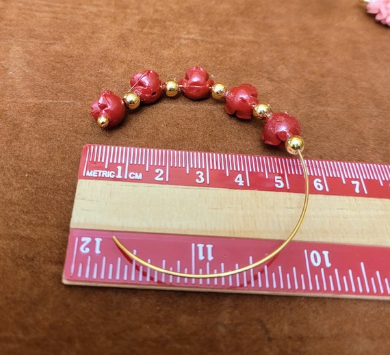 Hoop earrings with roses.  60mm diameter approx. Sold as pair. Ideal love gift.