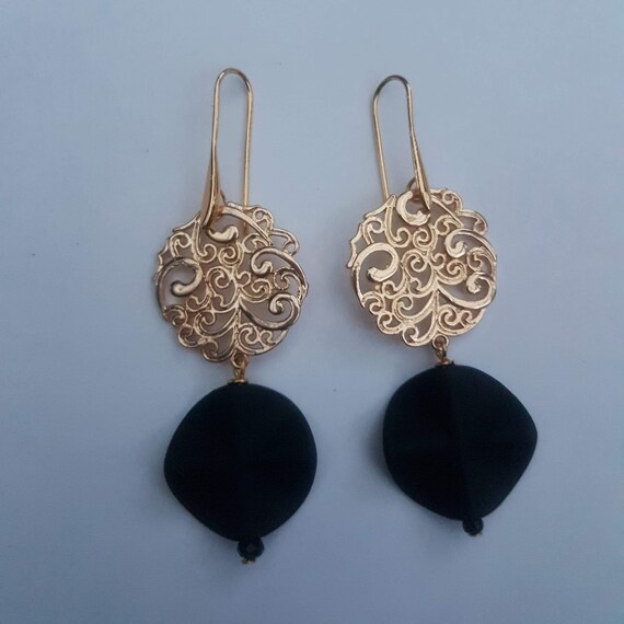 Unique Black and gold earrings comes in organza gift bag.