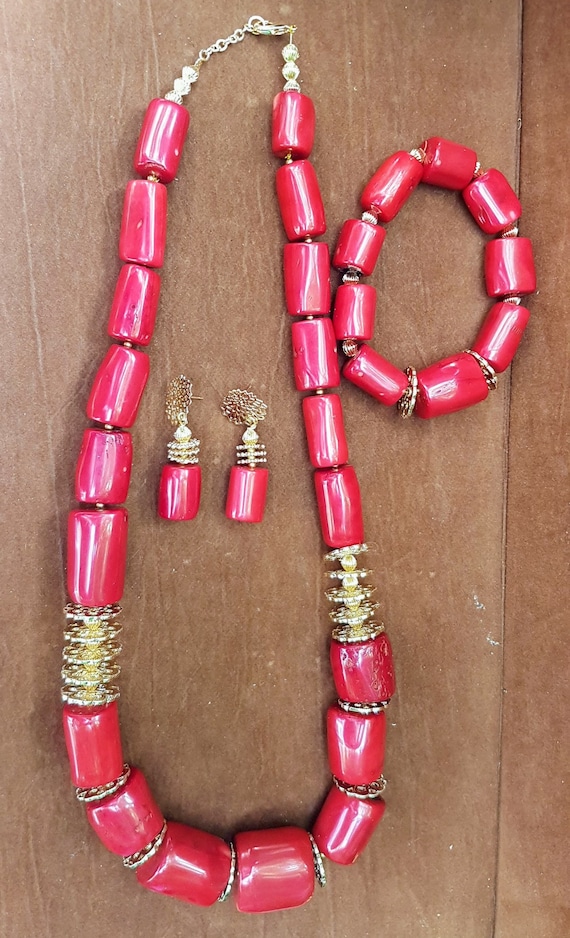 REDUCED!!! Red coral set. Nigerian Wedding design with class. Very unique set. Necklace, pair of earrings and bracelet to match. Yoruba red.