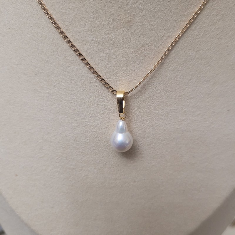 Pendentif unique perle baroque et liane de diamants