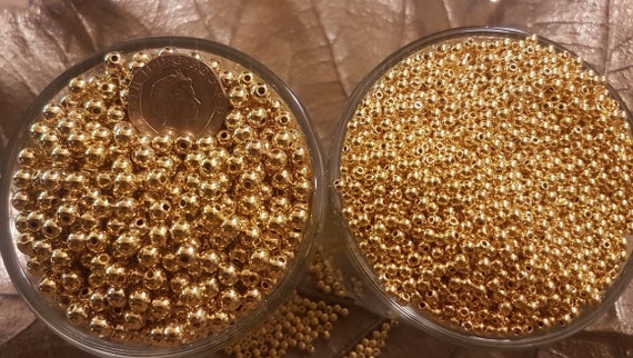 12/5/2.5mm  silver or gold  plated spacer beads.