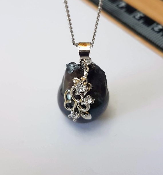 Gorgeous Grey baroque AAAA pearl pendant 15 x 25mm approx. with 925 silver bail & trim. This piece is unique. Chain  not included.