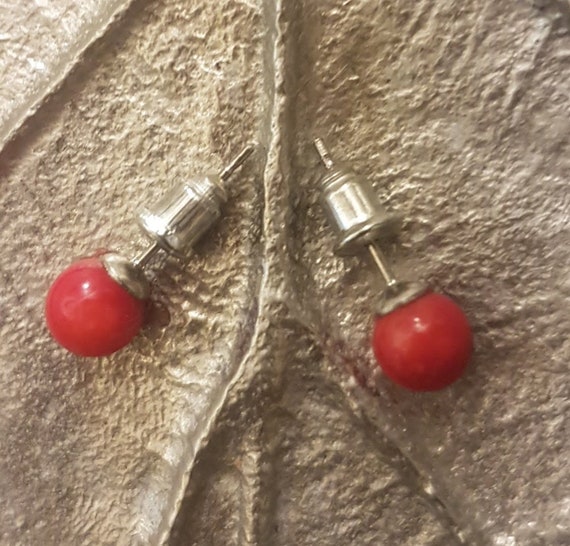 8mm red stud  earrings. Dyed shell high luster. Sold by the pair.
