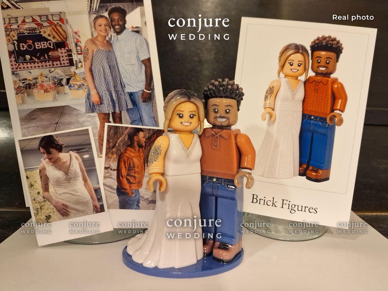 May include: A custom figurine set featuring two plastic figures resembling a couple, with one figure in a white gown and the other in an orange polo shirt and blue jeans, standing on a blue circular base, displayed with printed photographs.