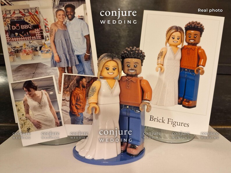 May include: A custom figurine set featuring two plastic figures resembling a couple, with one figure in a white gown and the other in an orange polo shirt and blue jeans, standing on a blue circular base, displayed with printed photographs.