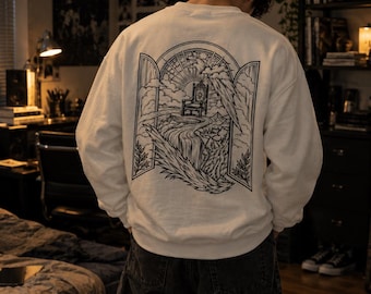 Sin Límites sweatshirt | Spanish text, open window landscape back print