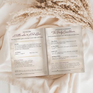 May include: An open instructional booklet titled The Faux Stained Glass Party Playbook with beige pages and black text. The left page outlines The Welcome and What Is Inside, while the right page details The Party Countdown and guest reminders.