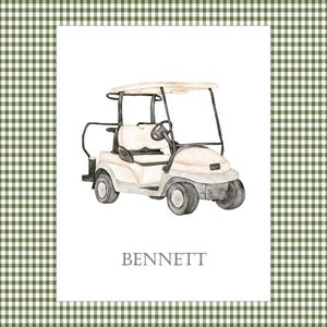 May include: A white golf cart with black wheels and a black steering wheel. The cart has a white canopy and the name "BENNETT" is written below the cart.