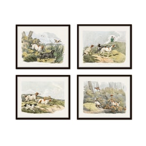 May include: A set of four vintage illustrations featuring hunting dogs in various poses. The illustrations are in a classic style with detailed linework and muted colors. The dogs are depicted in a variety of settings, including fields, forests, and hills.