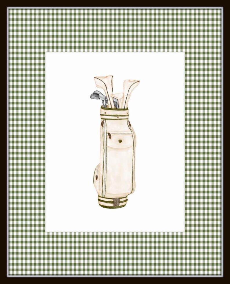 May include: A white golf bag with brown leather accents and golf clubs sticking out of the top. The bag is sitting on a white background.