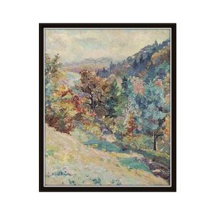 May include: A framed oil painting depicting a landscape scene with a winding path through a forest. The trees are painted in shades of green, blue, and brown, with hints of red and yellow. The sky is a soft blue with white clouds.