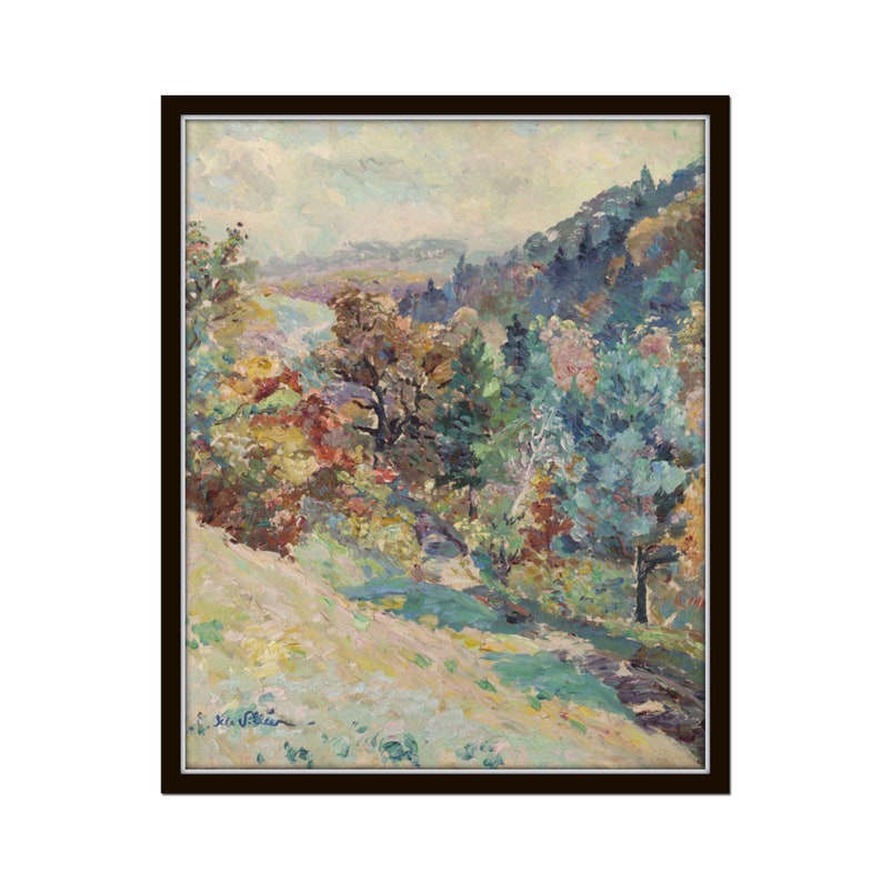 May include: A framed oil painting depicting a landscape scene with a winding path through a forest. The trees are painted in shades of green, blue, and brown, with hints of red and yellow. The sky is a soft blue with white clouds.