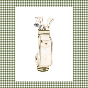 May include: A white golf bag with brown accents and a set of golf clubs inside. The bag is on a white background.