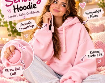 Puede incluir: Una sudadera con capucha sensorial rosa claro de ajuste relajado, tela de forro polar pesado y cordones masticables. Las mangas incluyen puños con pelota antiestrés. El texto dice: Sensory Hoodie, Comfort. Calm. Confidence.