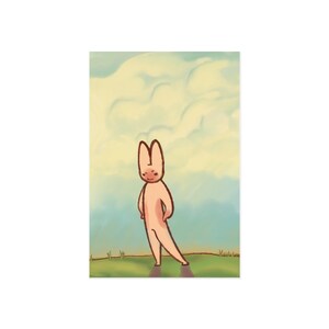 May include: A digital illustration of a light peach-colored anthropomorphic rabbit character standing in a green field under a pale blue sky with soft, rounded clouds. The rabbit has long ears, a simple face, and is posed with one leg extended.
