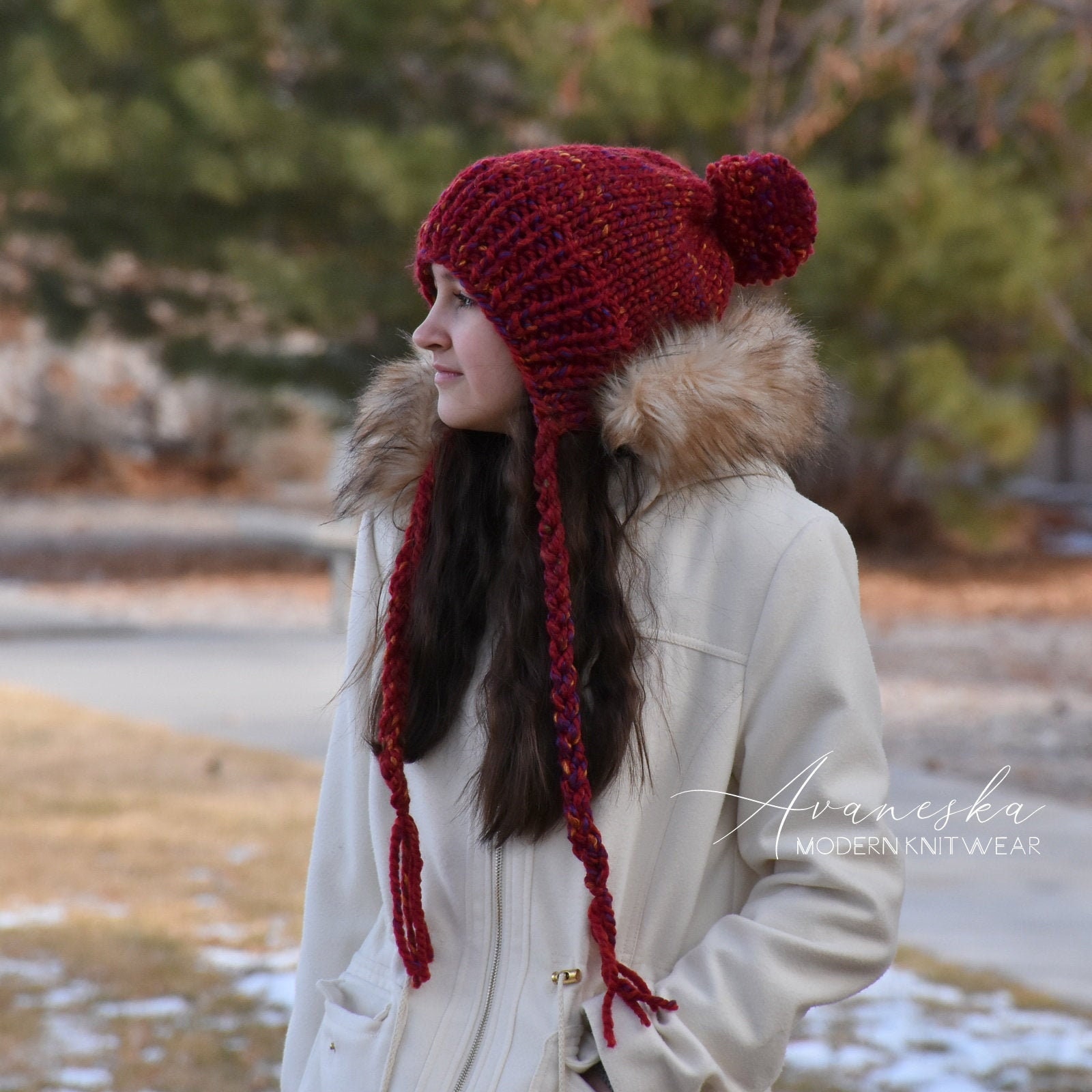 earflap pom pom hat
