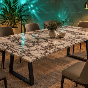 May include: A rectangular dining table featuring a polished white and dark grey marble top with a prominent veined pattern. The table is supported by two black metal U-shaped legs and is surrounded by six grey upholstered chairs with black legs.