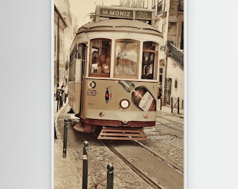 The Lisbon tram Elétricos is an iconic mode of transportation that has been running on electricity through the narrow steep streets of the O
