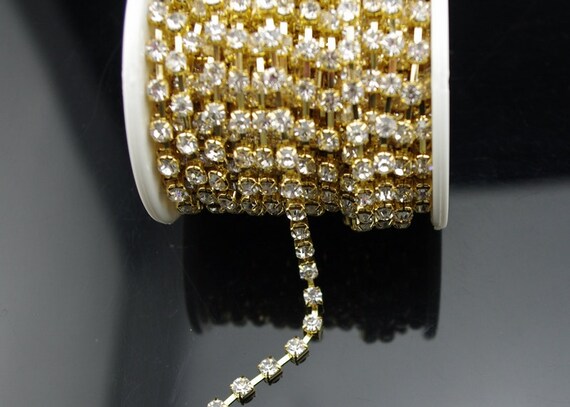8ss Crystal Rhinestone Chain (set in gold metal) 10 yard bolt