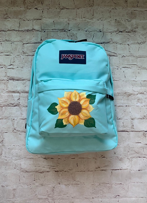 white sunflower jansport backpack