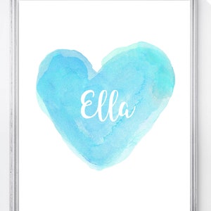 May include: A light blue watercolor heart with the name "Ella" written in white inside.