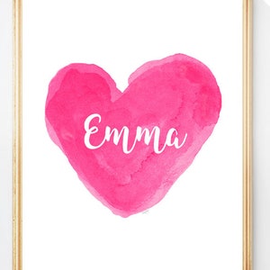May include: A pink watercolor heart with the name "Emma" written in white inside.